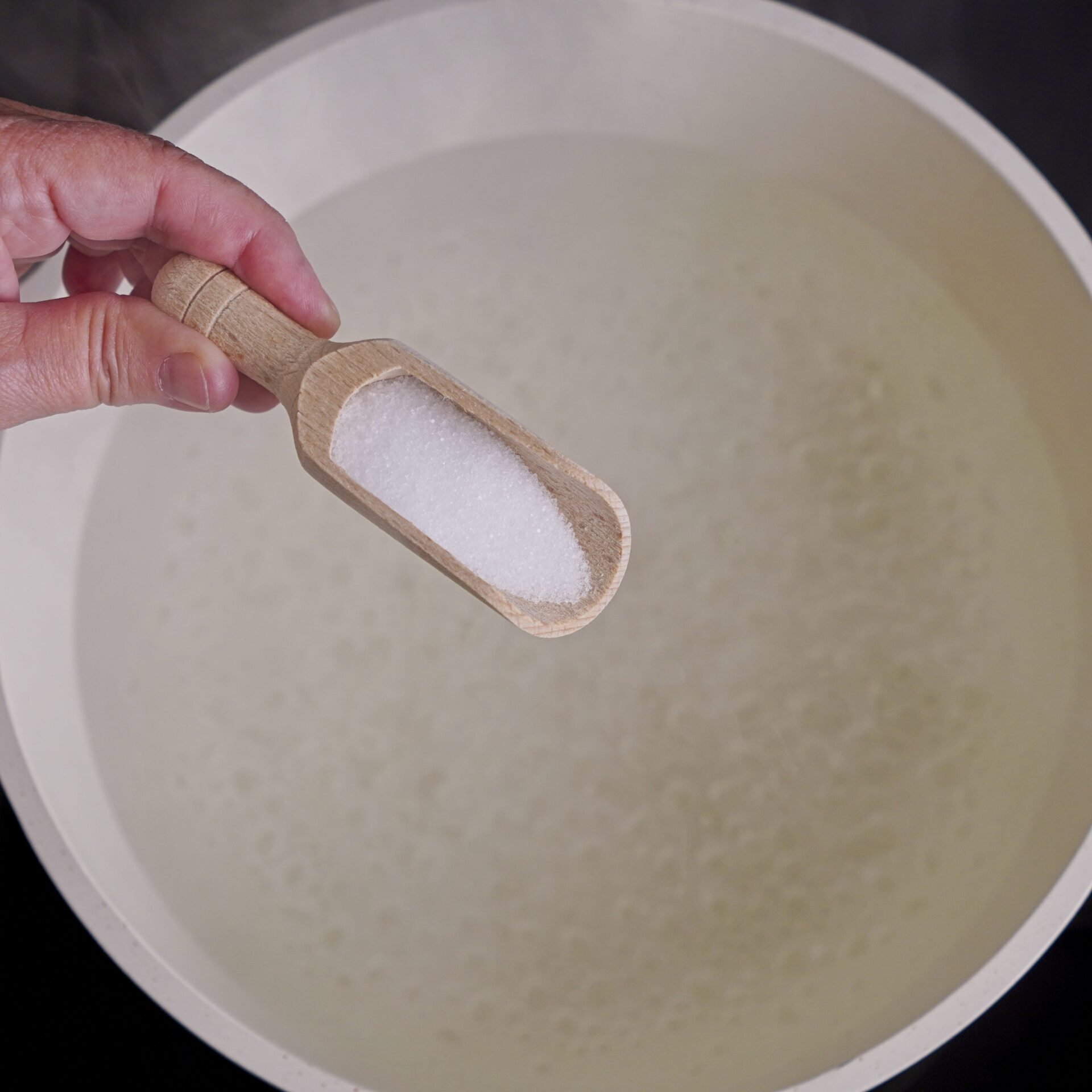 Add salt to the water before you cook the pasta in it.