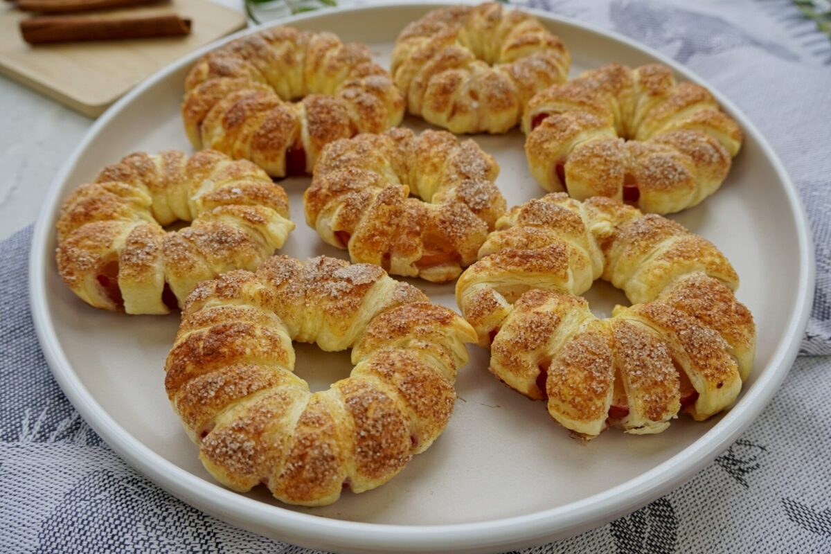 Apples in pastry freshly baked with crispy cinnamon sugar topping.