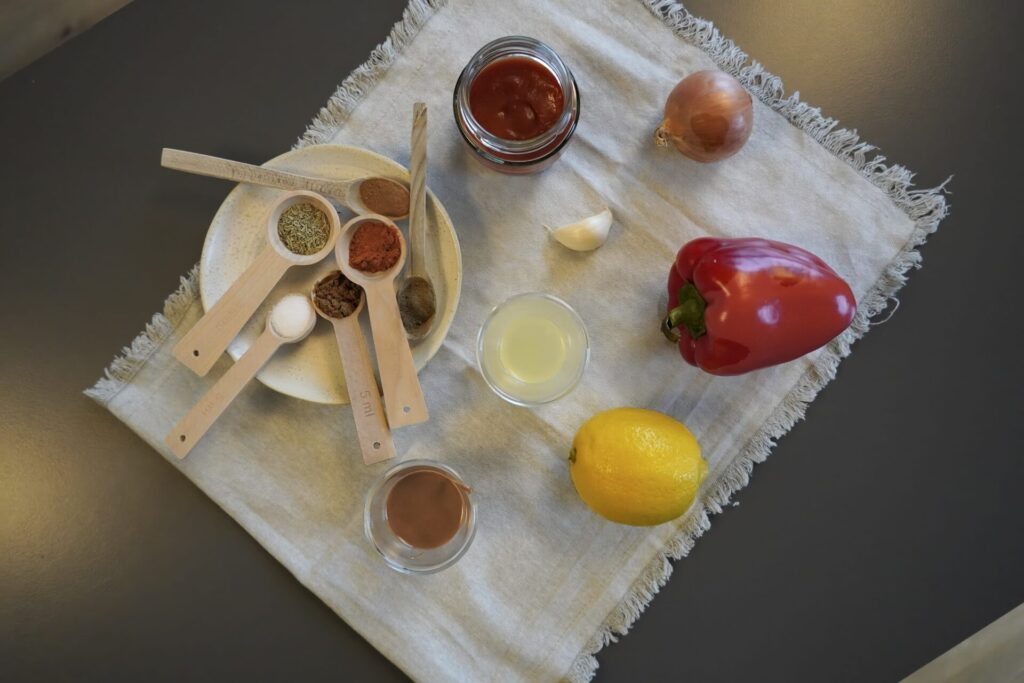 Ingredients for black bean soup: bell pepper, onion, passata, almond butter, garlic. And unique spice blend. 