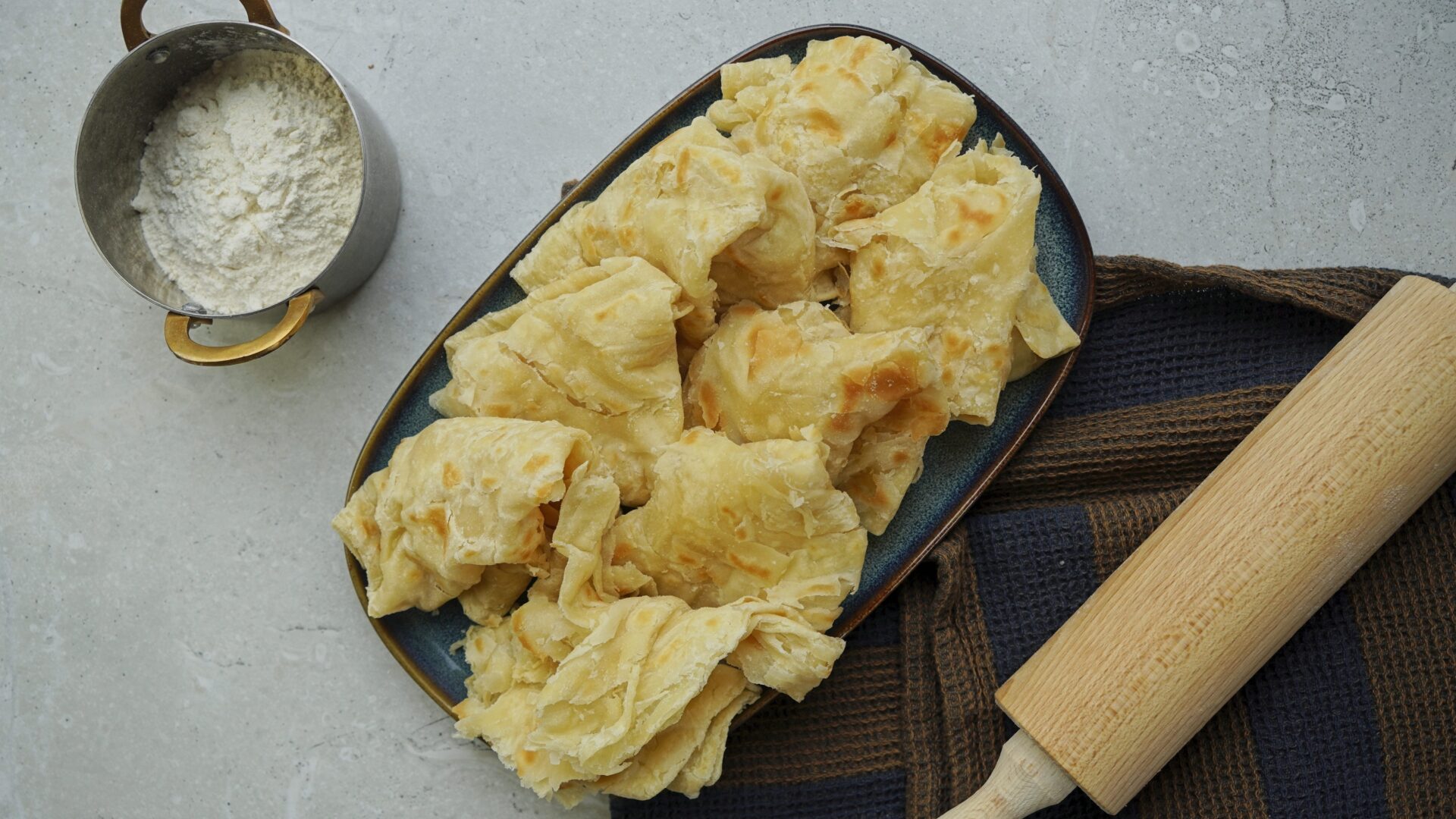 Top-down view of freshly cooked Guyanese roti.