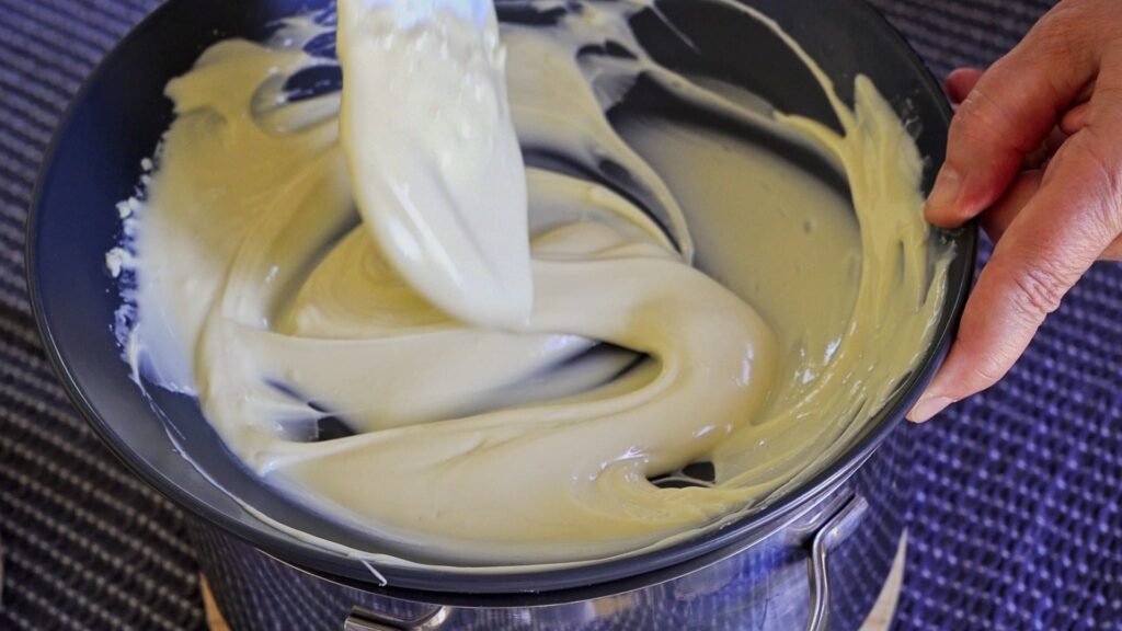 Texture of melted white chocolate after using a double boiler.