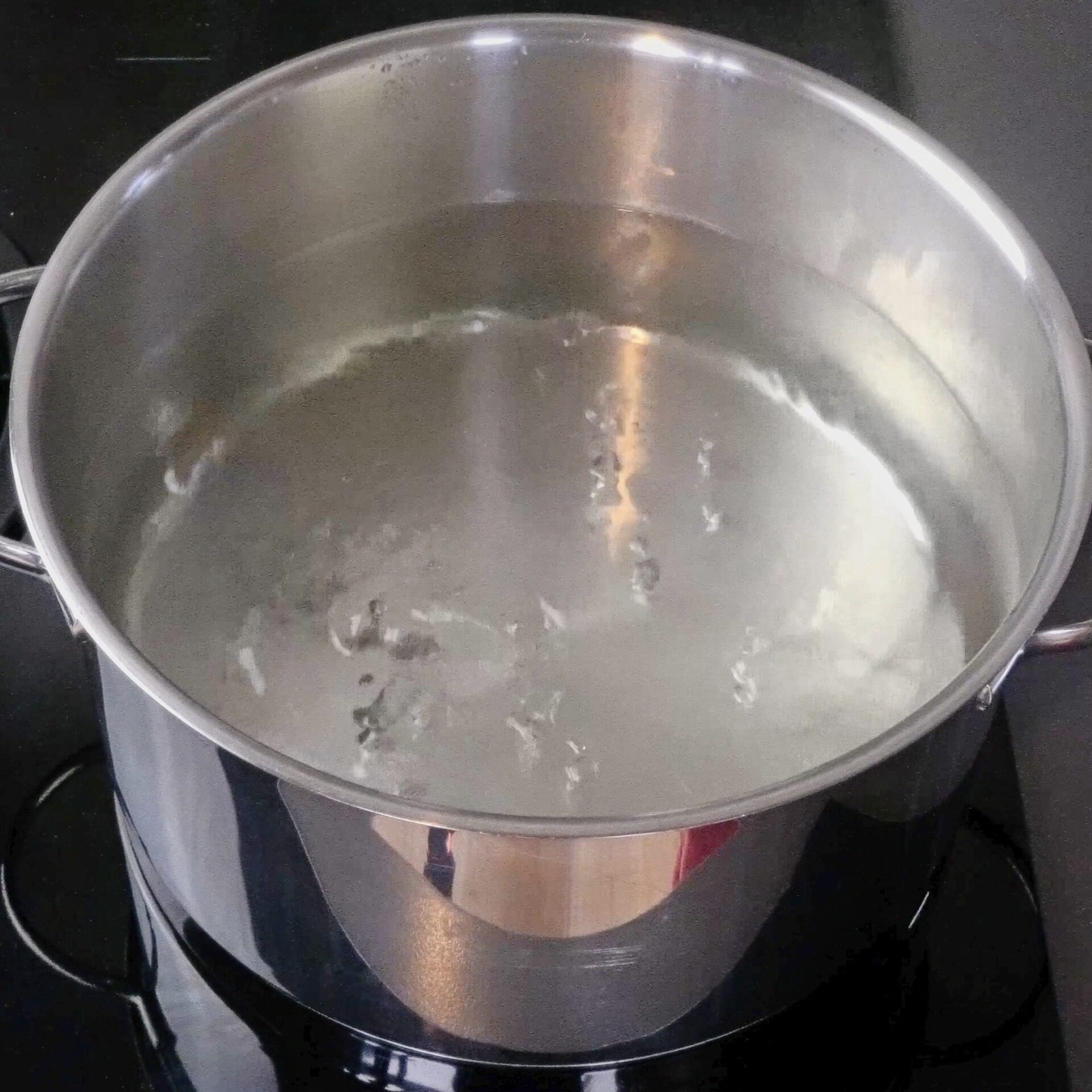 Boiling water in a pot, ready for cooking pasta.