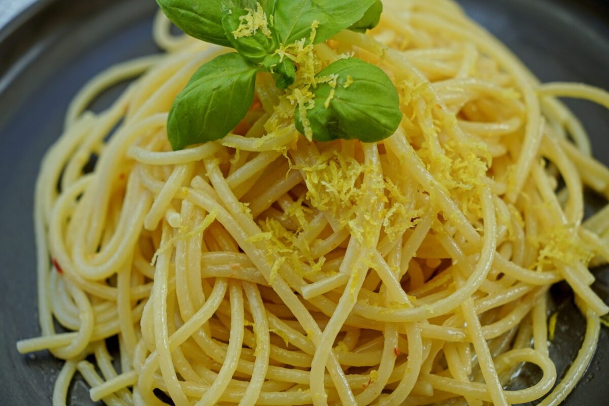 Lemon butter pasta made with pasta water, butter, lemon juice, and lemon zest.