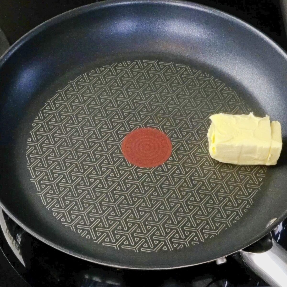 Butter melting in a hot pan to start the sauce.