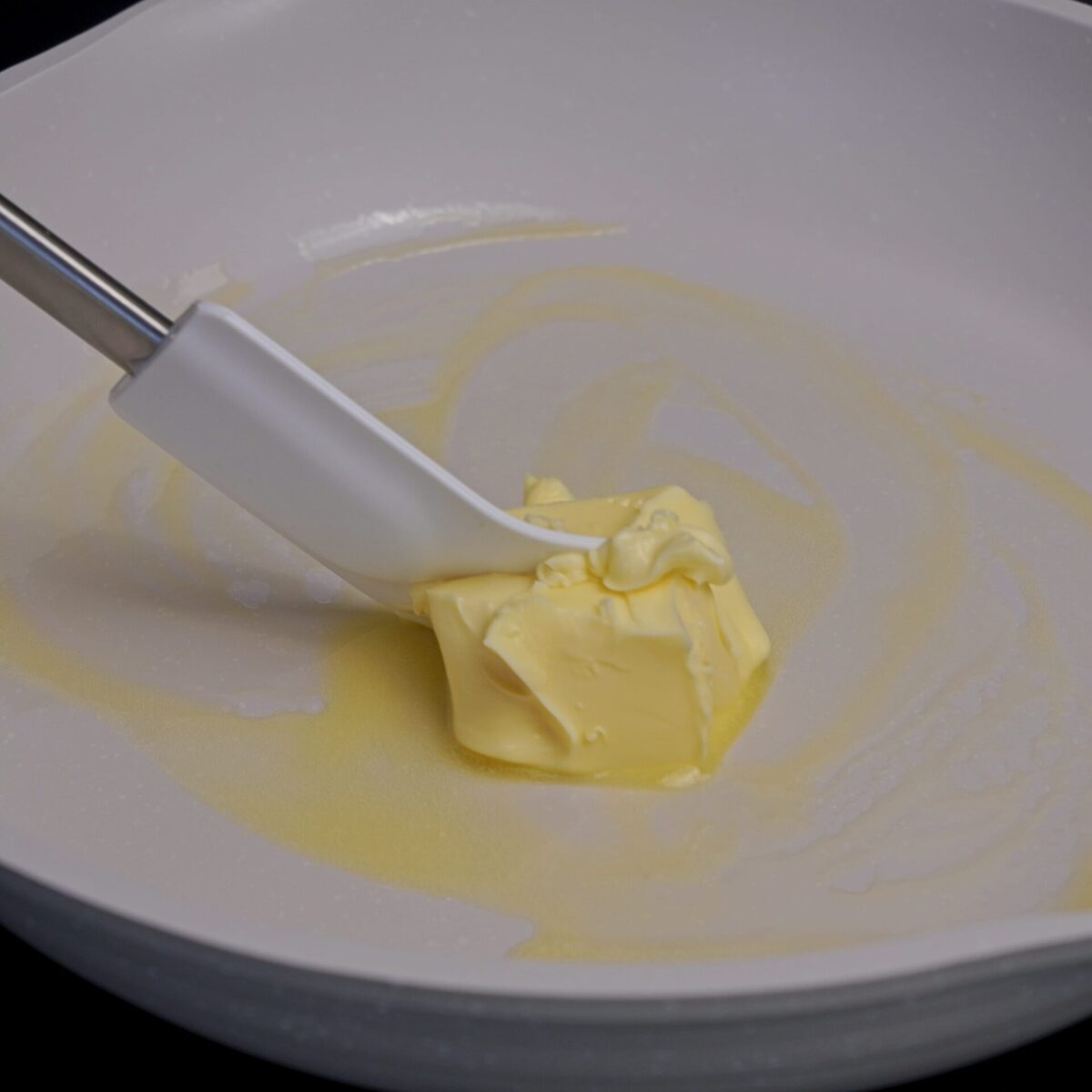 Butter melting in a hot pan to start the sauce.