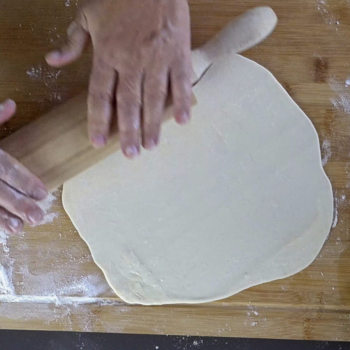 Rolling out the dough for the second method.