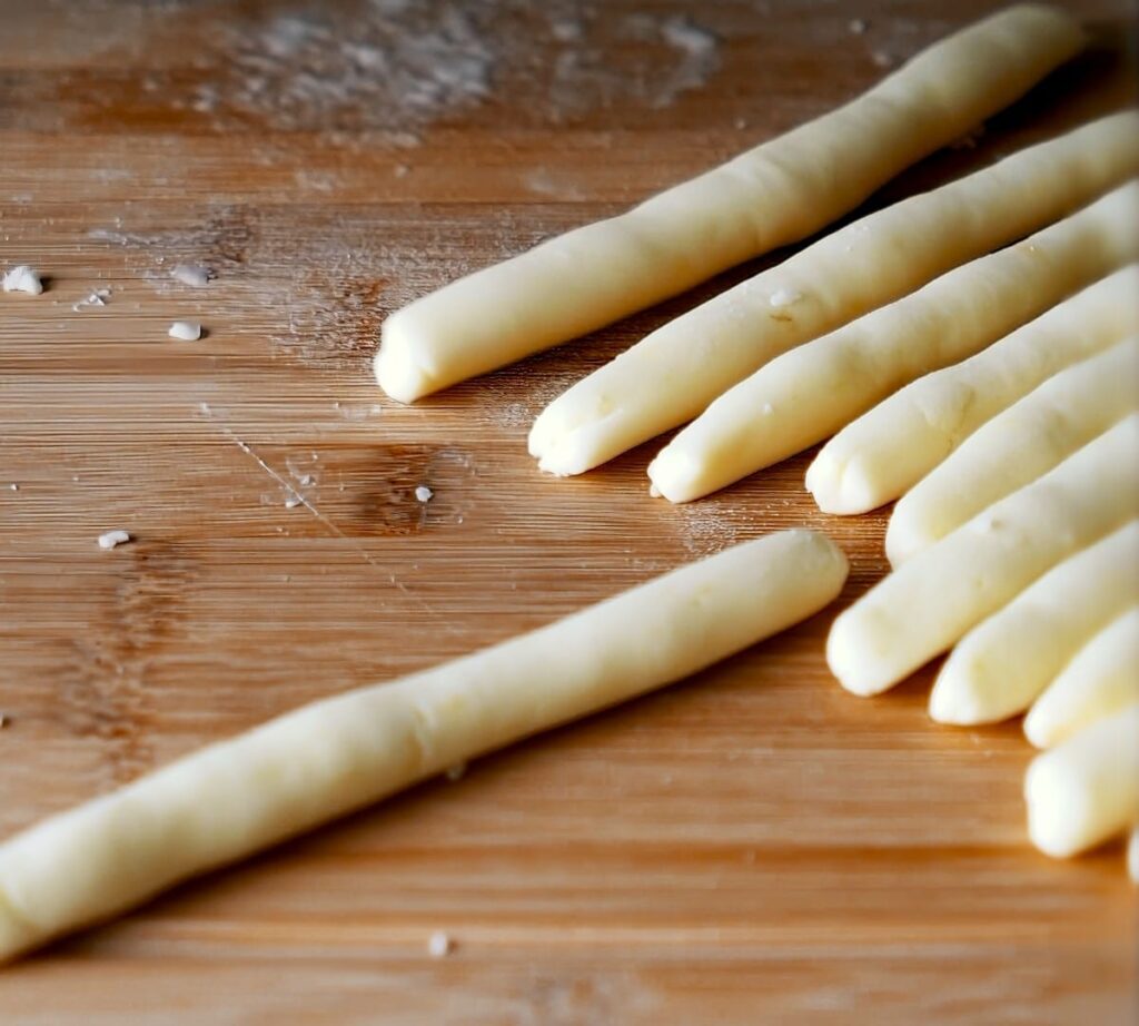 Making the dough and noodles for potato noodles.