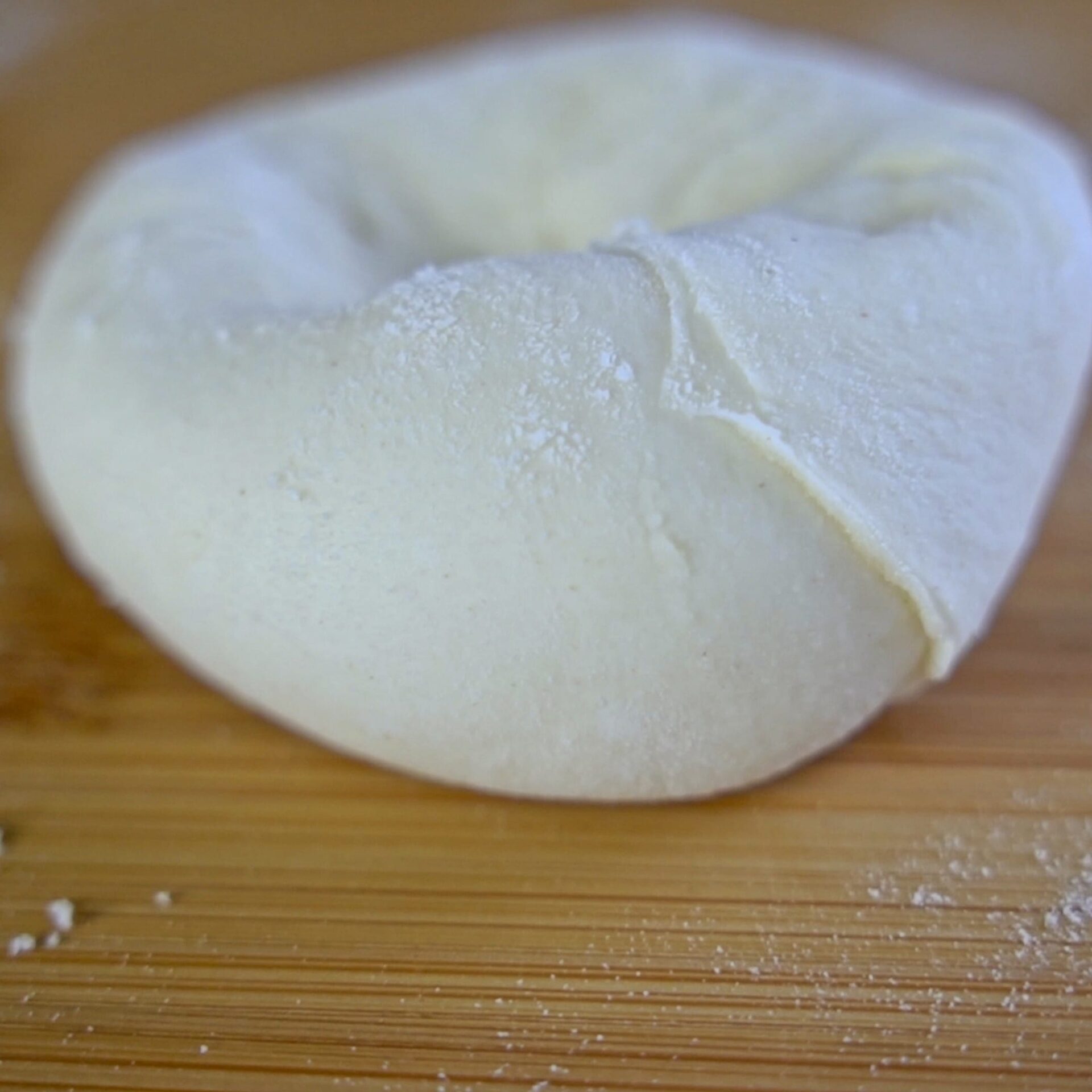Tucking in the edges to create layers.
