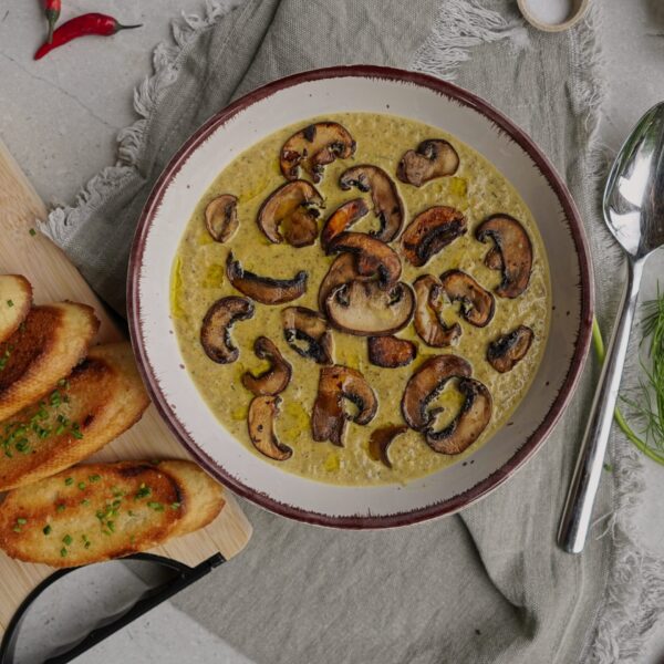 Ukrainian mushroom soup recipe with aromatic mushrooms, served with garlic bread.