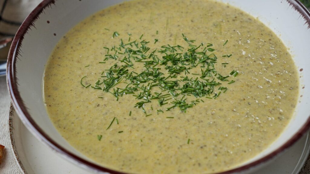 Rustic Ukrainian mushroom soup sprinkled with dill.